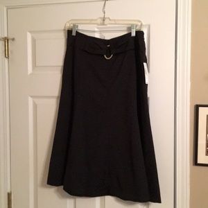 Mid length black skirt